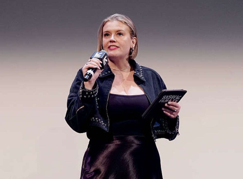 Claudette Godfrey speaking on stage